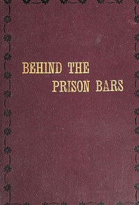 Behind the prison bars